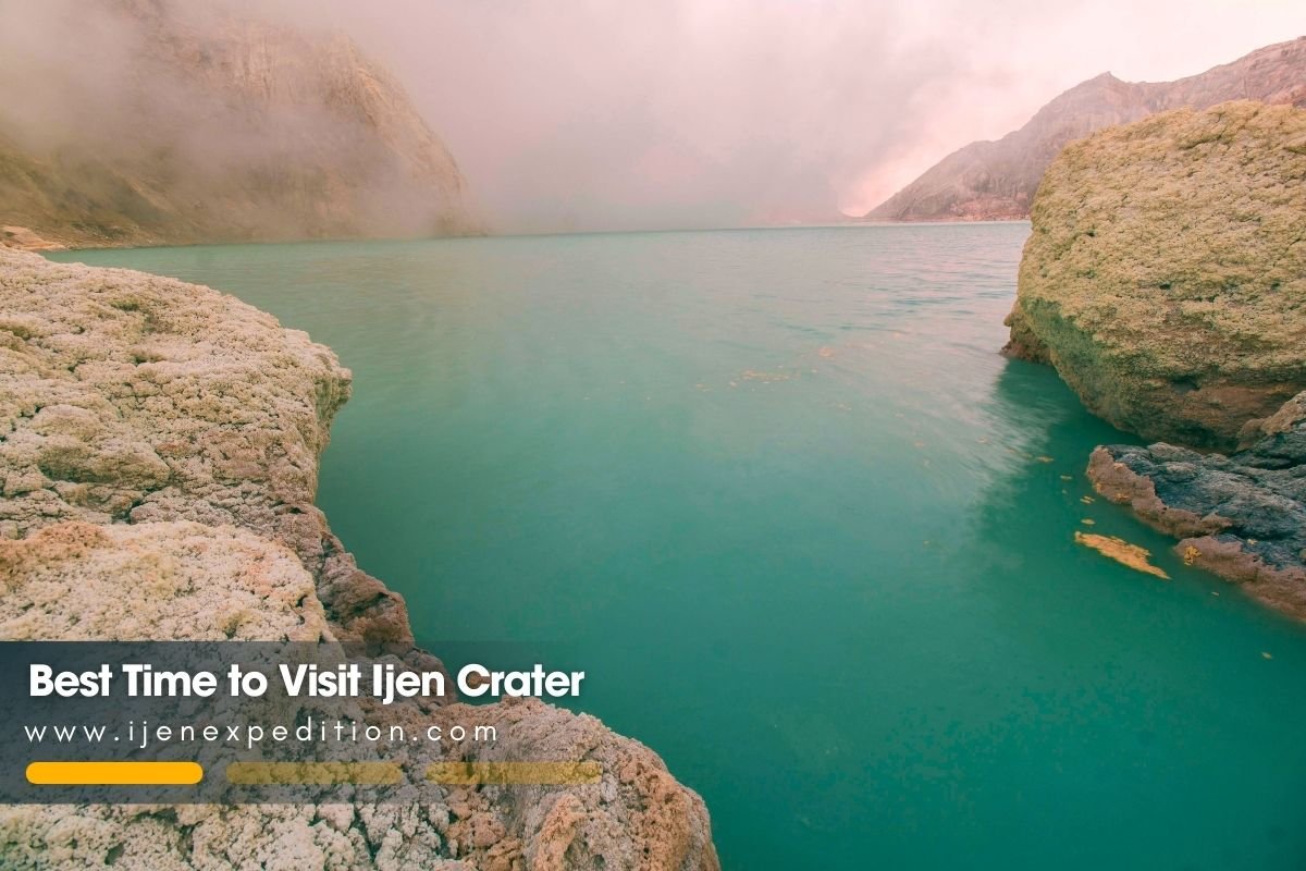 Turquoise volcanic lake at Ijen Crater surrounded by rugged cliffs