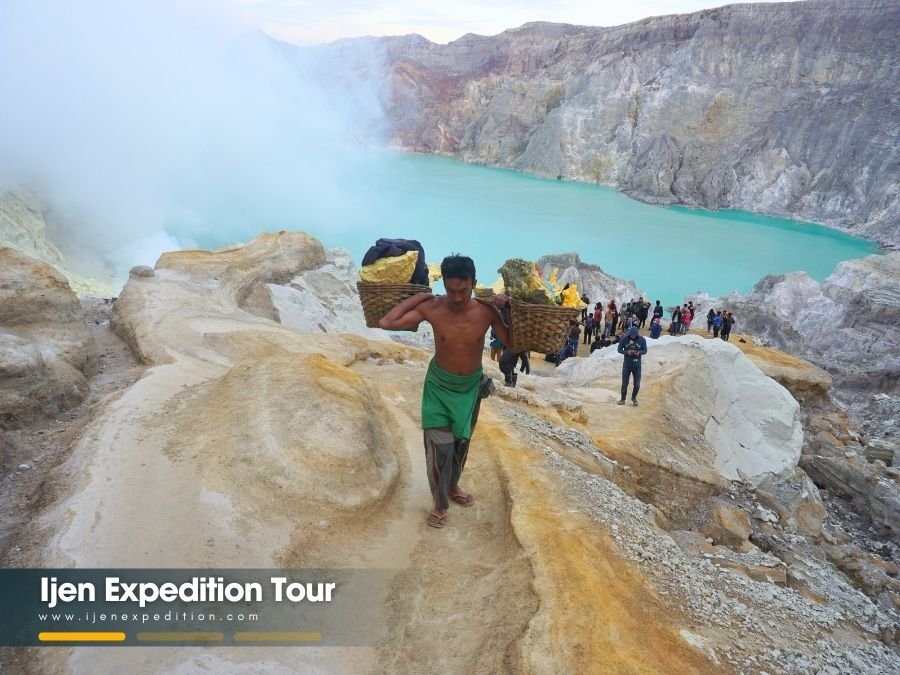 Traditional sulfur miners at Ijen Crater seen on Bromo Ijen Tour 3 Days 2 Nights