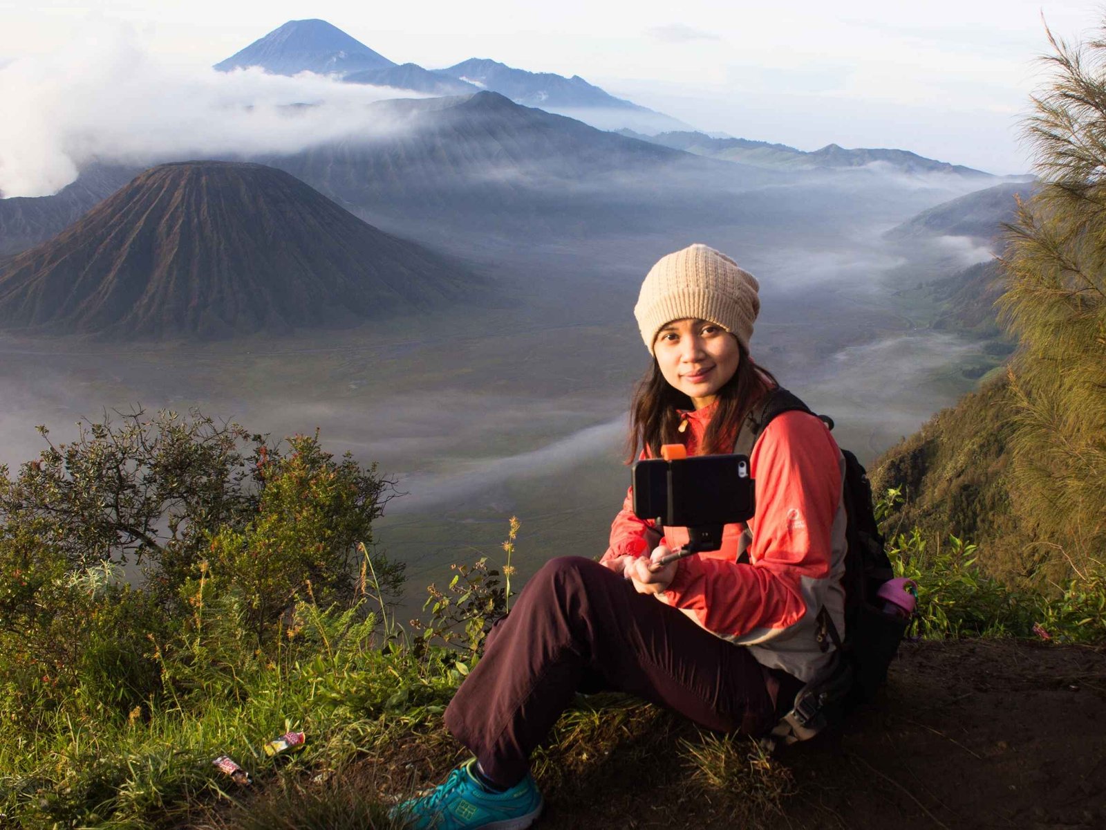 Tourists wearing thick jackets during cold Mount Bromo sunrise