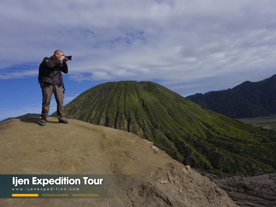 Hiking to Mount Bromo crater during a guided Mount Bromo tour
