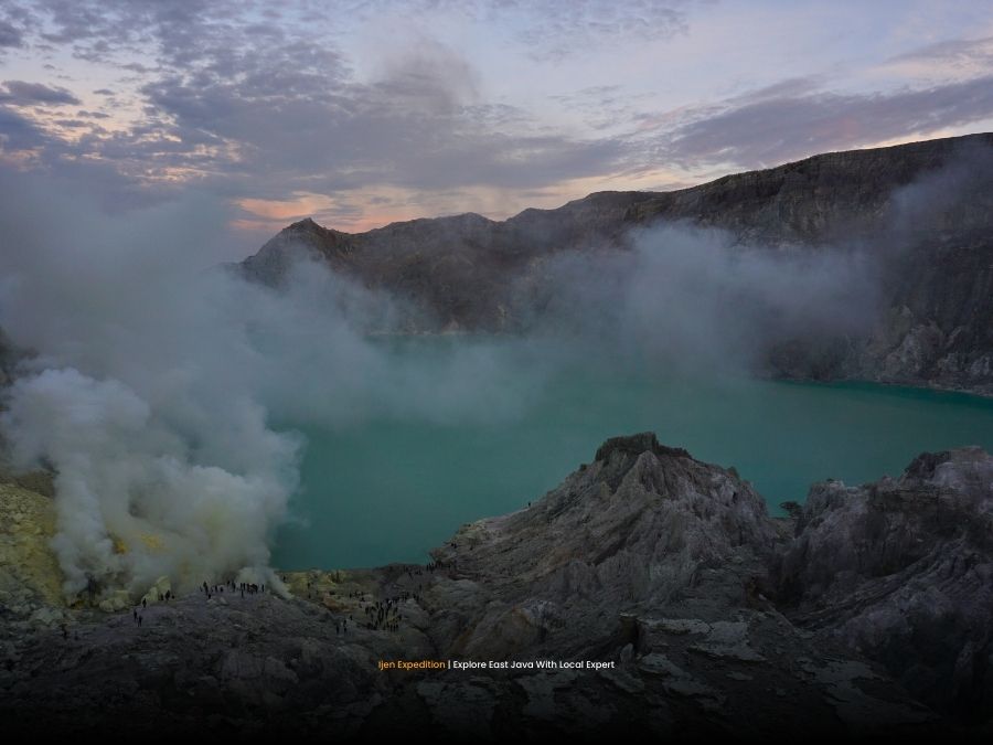 Sunrise over the largest acidic crater lake at Mount Ijen
