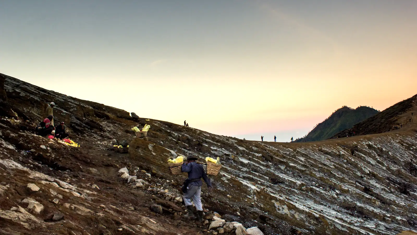 Hiking Trail of Mount Ijen The steep hiking trail of Mount Ijen with sulfur smoke in the distance