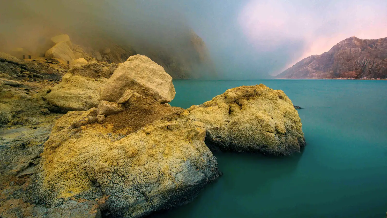 The Turquoise Abyss of Ijen Crater Stunning turquoise waters of Ijen Crater showcasing the world's most acidic volcanic lake and its hydrothermal system